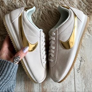 nike cortez with gold swoosh